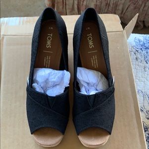 Black woven new without tag but never worn.